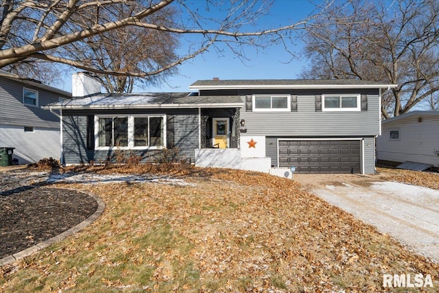 tri-level home featuring a garage