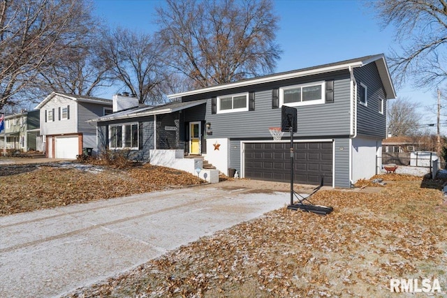 split level home with a garage