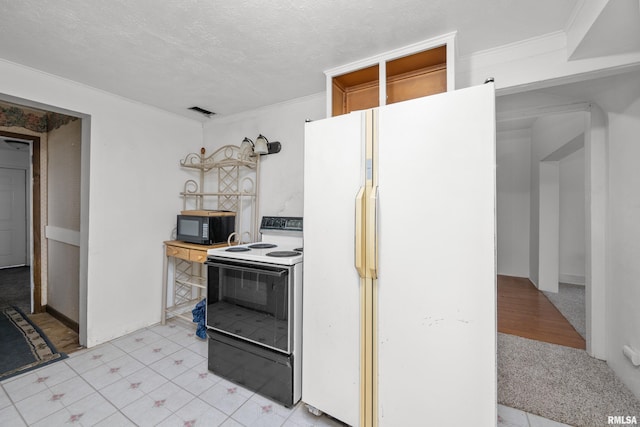 kitchen featuring white fridge, crown molding, electric range, and a textured ceiling