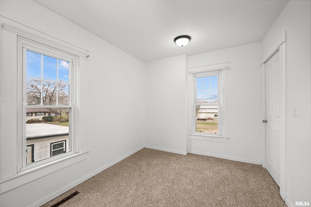 view of carpeted spare room