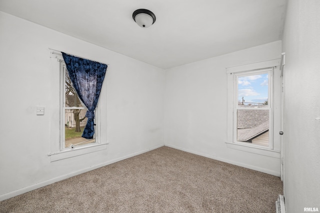 view of carpeted spare room