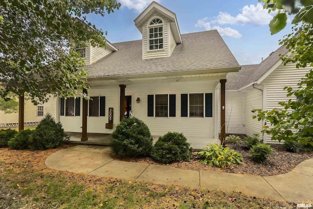 view of new england style home