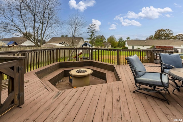 deck featuring a fire pit