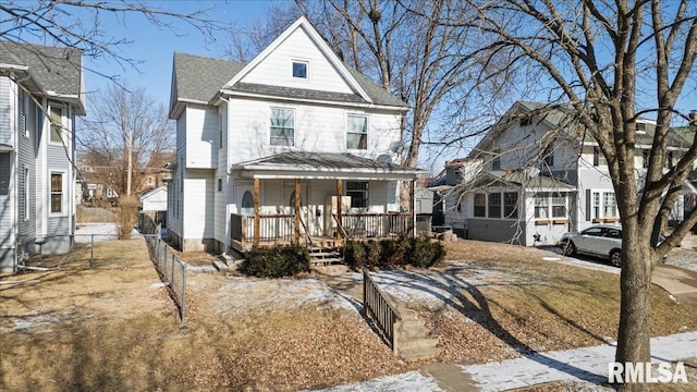 view of property featuring a porch