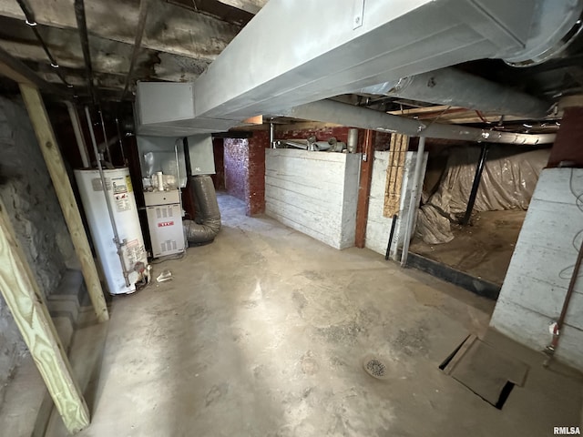 basement with heating unit and water heater