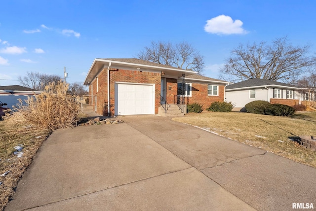 single story home featuring a garage and a front yard