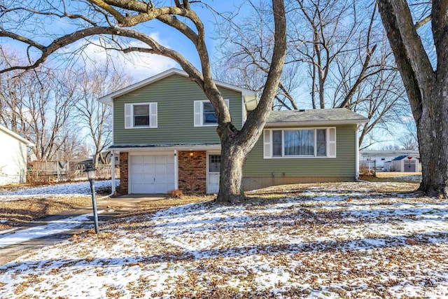 split level home with a garage