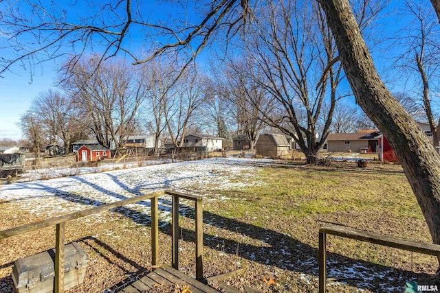 view of yard covered in snow