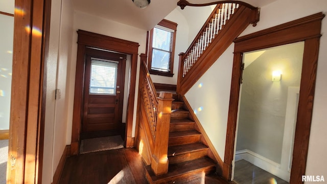 stairs with wood-type flooring