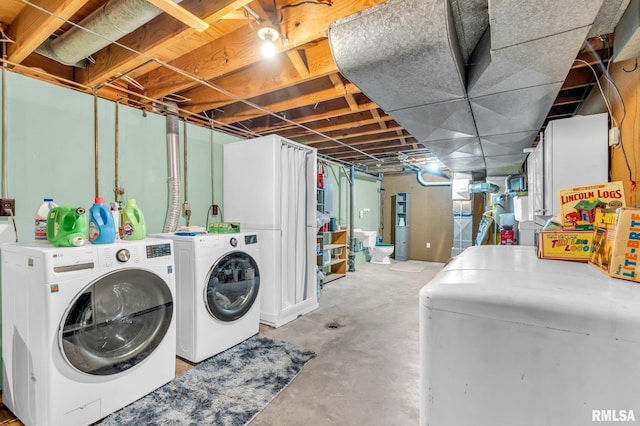 laundry area featuring independent washer and dryer