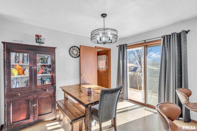 dining room with a notable chandelier