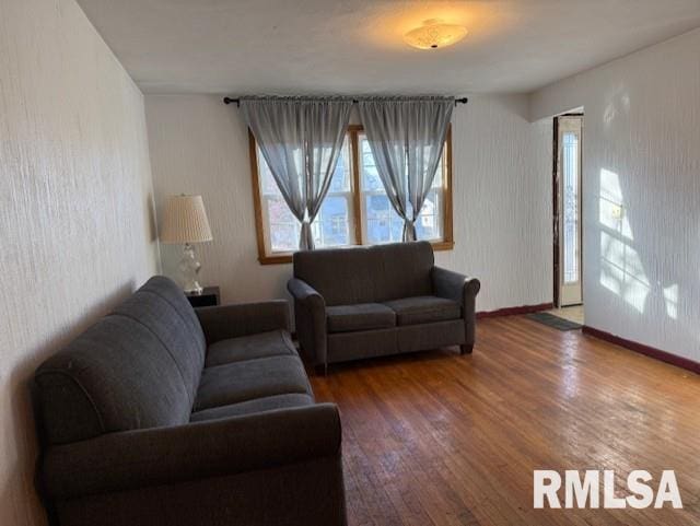 living room with dark hardwood / wood-style floors