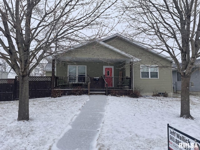 bungalow-style home with covered porch