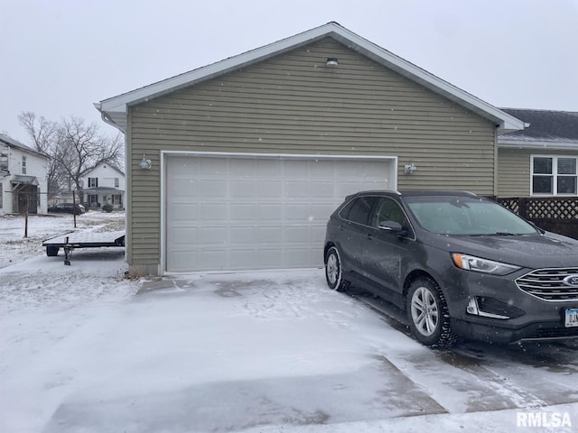 view of snow covered garage