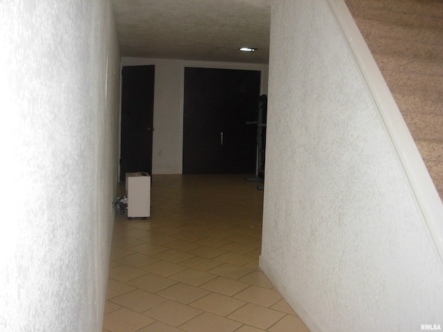 corridor featuring tile patterned floors