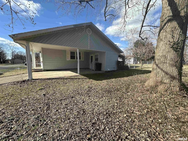 rear view of house with a patio area