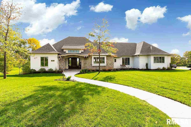 view of front of home with a front yard