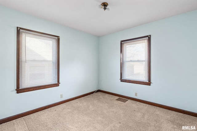 empty room featuring carpet