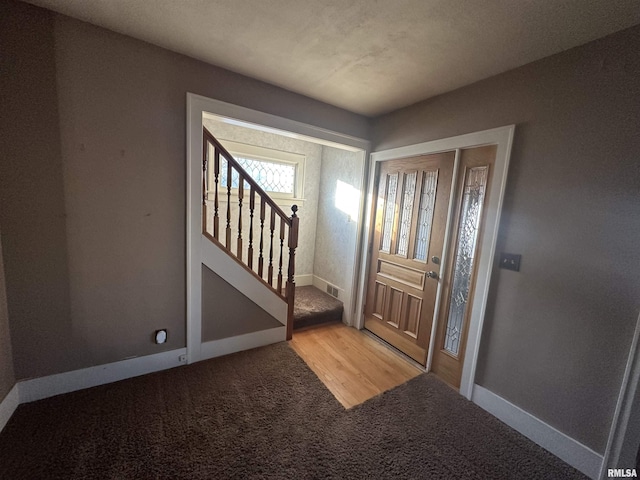 entryway featuring wood-type flooring