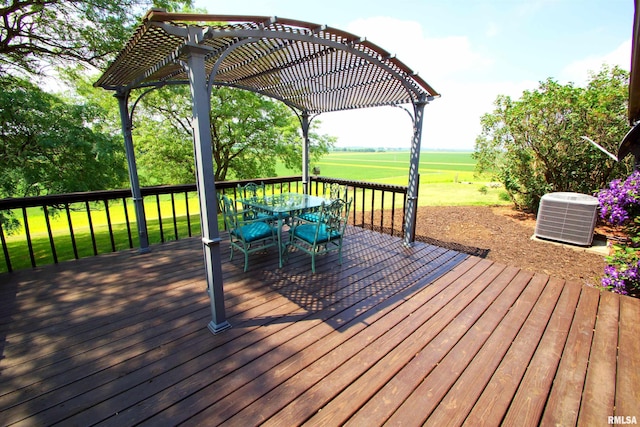 deck featuring a pergola, a lawn, and central air condition unit