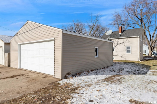 view of snow covered garage