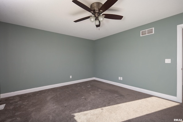 empty room featuring carpet and ceiling fan