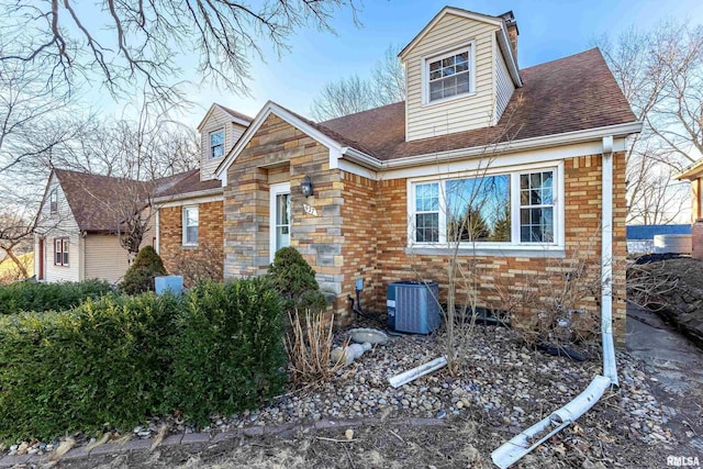 view of front of home with central air condition unit