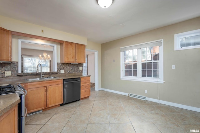 kitchen with sink, black dishwasher, decorative backsplash, light tile patterned flooring, and gas range