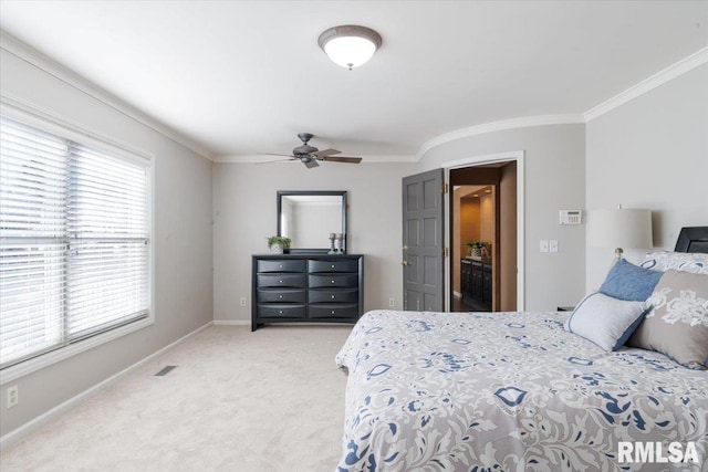 bedroom featuring visible vents, baseboards, light colored carpet, and crown molding