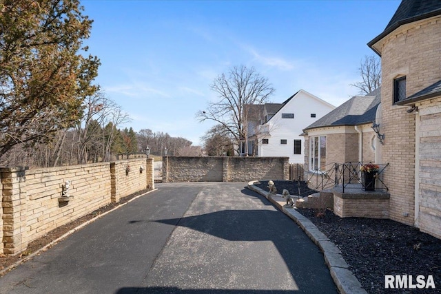 view of street featuring driveway