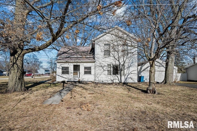 view of home's exterior featuring a yard