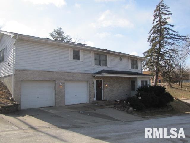 front of property featuring a garage