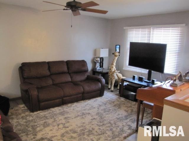 living room with ceiling fan