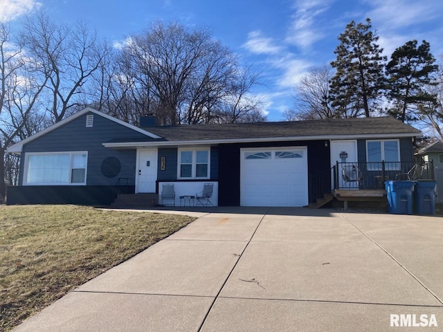 single story home with a front lawn and a garage