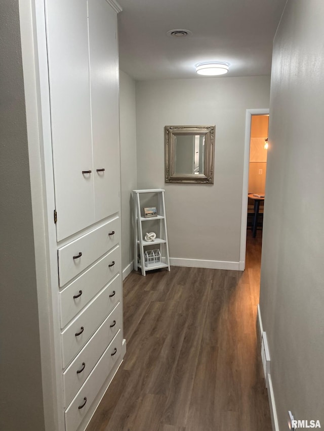 hall featuring dark hardwood / wood-style flooring