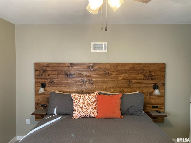 unfurnished bedroom featuring ceiling fan