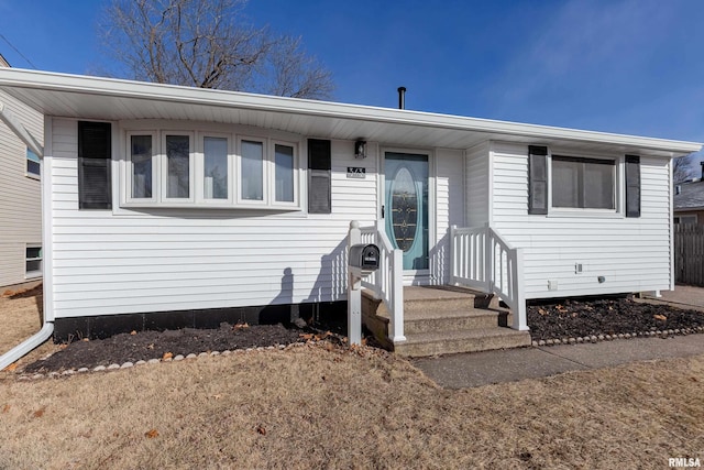 manufactured / mobile home with a front lawn