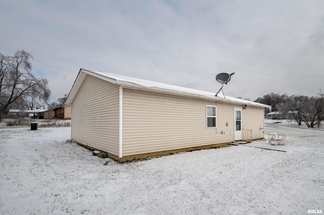 view of snow covered property