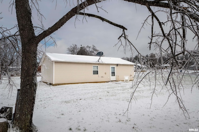 view of snow covered property