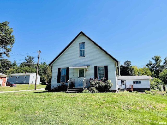 view of front facade with a front yard