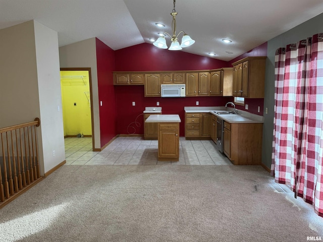 kitchen with pendant lighting, dishwasher, a kitchen island, vaulted ceiling, and light colored carpet