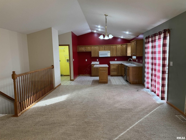 kitchen with a center island, decorative light fixtures, light carpet, sink, and a notable chandelier