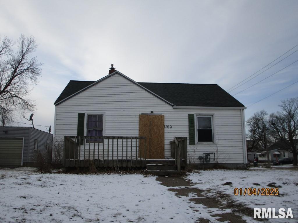 view of snow covered property