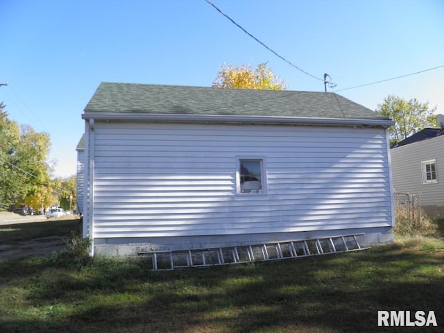 view of property exterior featuring a lawn