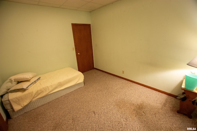 591 Breezy Point Dr, Clinton, IA 52732 - bedroom featuring light carpet, a drop ceiling, and baseboards