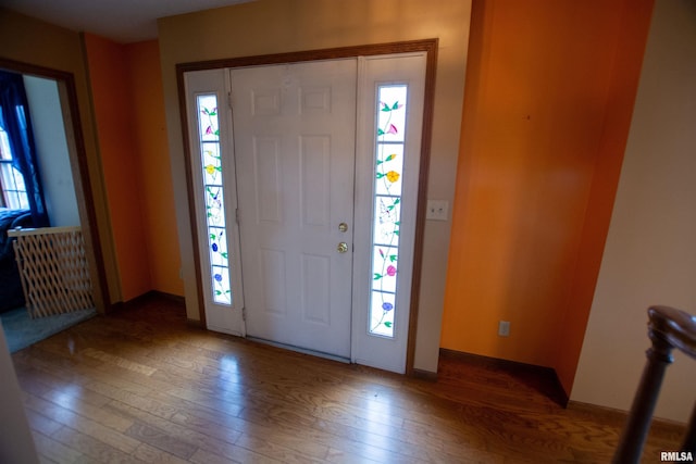 591 Breezy Point Dr, Clinton, IA 52732 - foyer featuring hardwood / wood-style flooring