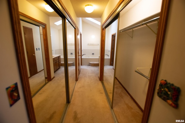 591 Breezy Point Dr, Clinton, IA 52732 - corridor featuring light carpet