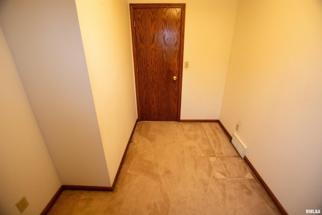 591 Breezy Point Dr, Clinton, IA 52732 - corridor featuring light carpet and baseboards