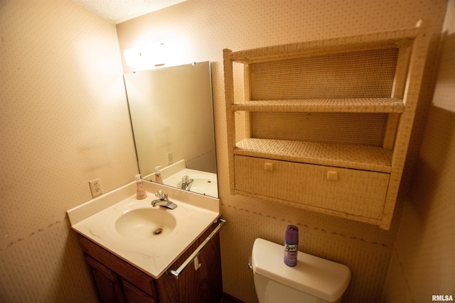 591 Breezy Point Dr, Clinton, IA 52732 - bathroom with vanity and toilet