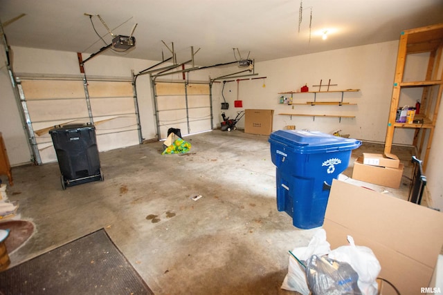 591 Breezy Point Dr, Clinton, IA 52732 - garage featuring a garage door opener
